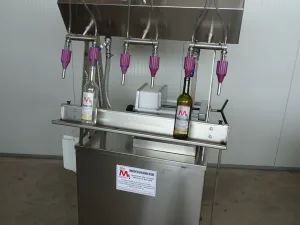 SEMI-AUTOMATIC IN-LINE-FILLER 6 NOZZLES WITH FILTER PLATES 20X20 TO 2 HOLES NEW MACHINE