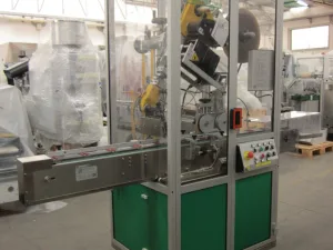 ETICHETTATRICE PER FIALE E FLACONI IN VETRO – PROGET SISTEM MOD. SIST