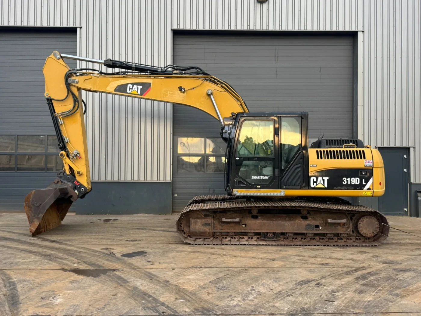 Caterpillar 319DL - 1