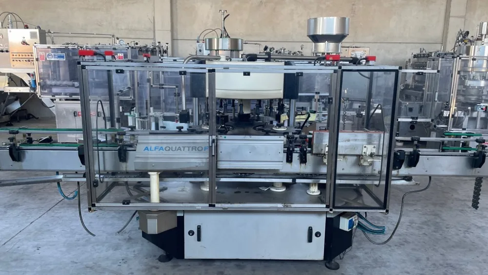 LABELLING MACHINE ALFA 4G WITH 16 HEADS, WITH SIMI ADHESIVE STATIONS YEAR 2012 FOR LABEL AND BACK-LABEL, SECOND-HAND MACHINE