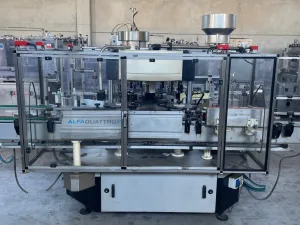 LABELLING MACHINE ALFA 4G WITH 16 HEADS, WITH SIMI ADHESIVE STATIONS YEAR 2012 FOR LABEL AND BACK-LABEL, SECOND-HAND MACHINE