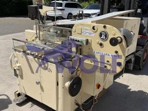 Stannioliermaschine RASCH - Type RU-E, mit Abrollstation.