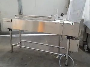 NASTRO TRASPORTATORE PER FLACONI A TAPPETO IN ACCIAIO INOX