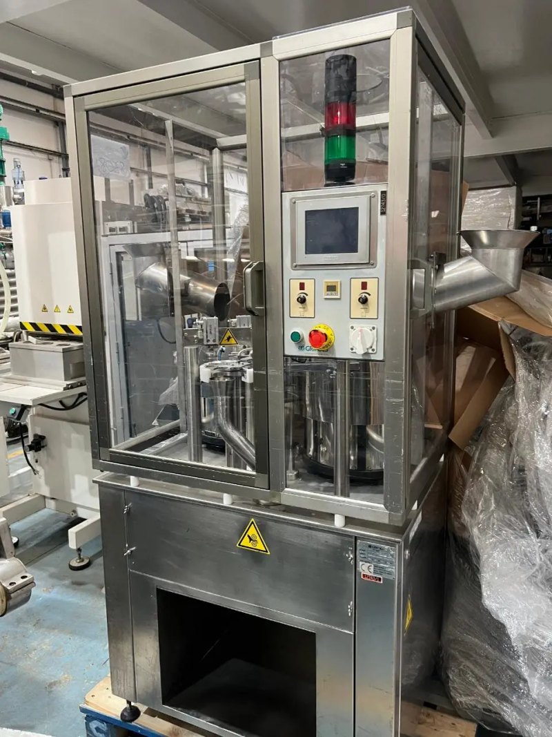 USED STAINLESS STEEL CAP ASSEMBLER