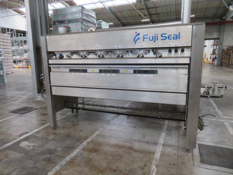 Fuji Seal Europe BV Fuji Seal Heat Shrink Tunnel - Flasche Sleever Line