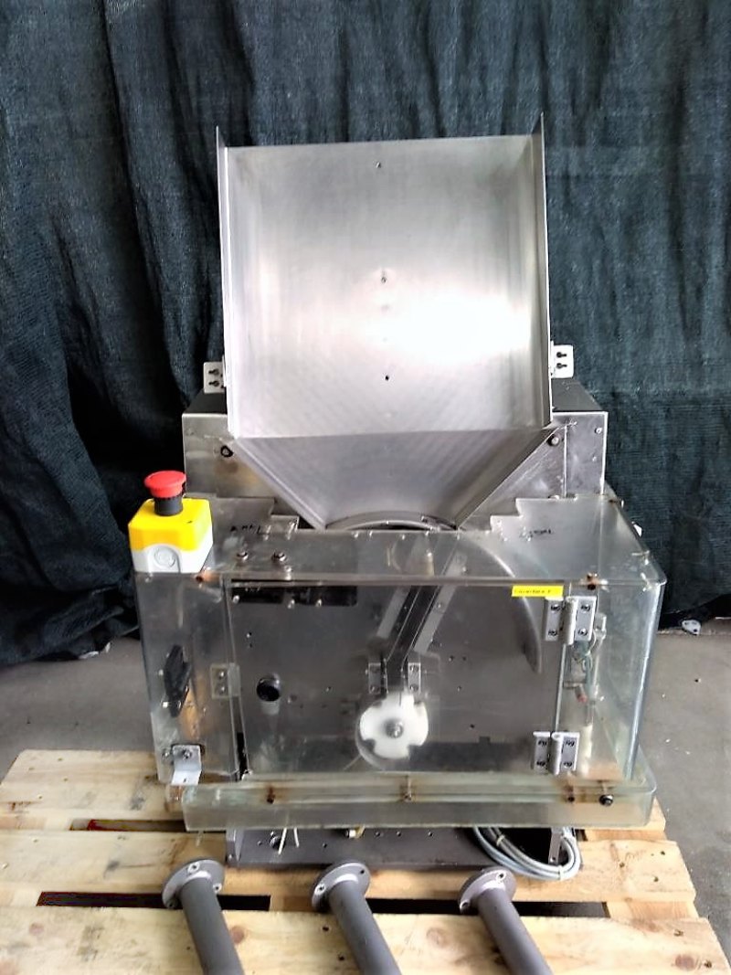 ALIMENTATORE AUTOMATICO DI FIALE E FLACONI – MARCHESINI