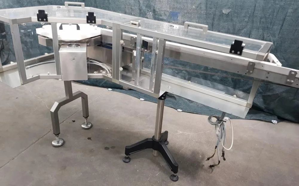 NASTRO TRASPORTATORE A TAPPETO IN ACCIAIO INOX CON CURVA A 90°