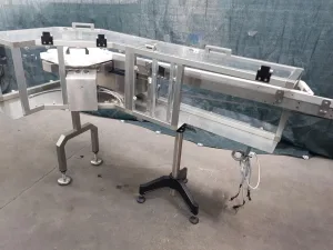 NASTRO TRASPORTATORE A TAPPETO IN ACCIAIO INOX CON CURVA A 90°