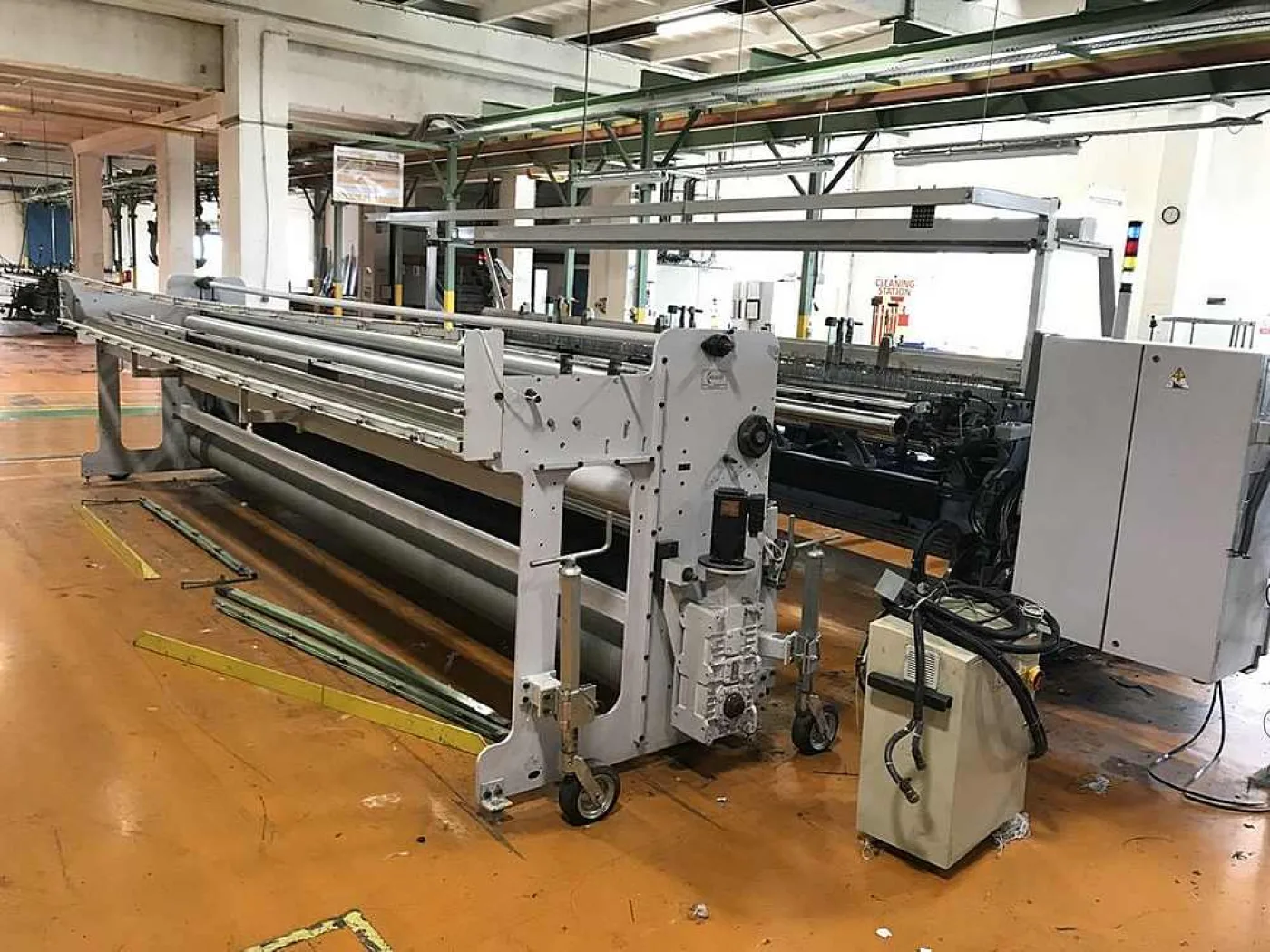 Warp feed device off loom warp tensioning system - 2
