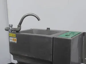 Wash basin with steriliser