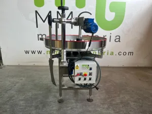 DISCO GIRATORIO CON RODILLO SUPERIOR MOTORIZADO PARA ALIMENTACION AUTOMATICA DE ENVASES