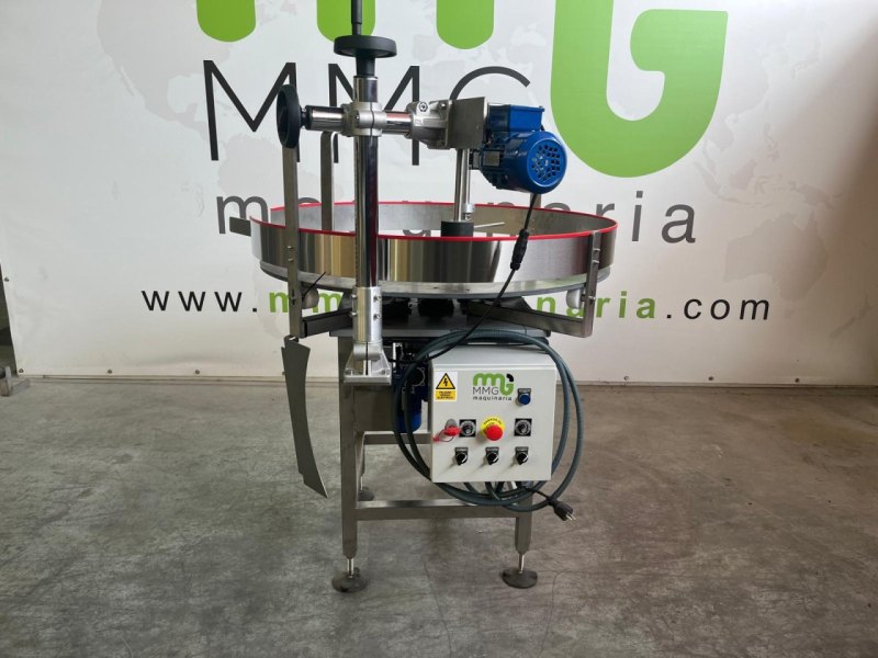 DISCO GIRATORIO CON RODILLO SUPERIOR MOTORIZADO PARA ALIMENTACION AUTOMATICA DE ENVASES