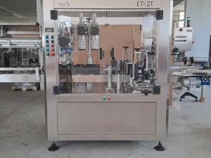 OMB THREE-STATION ADHESIVE LABELLING MACHINE WITH CAPSULE DISTRIBUTOR, SECOND-HAND MACHINE
