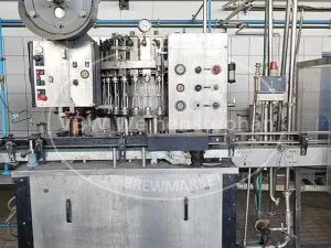 Bouteille filler and capper