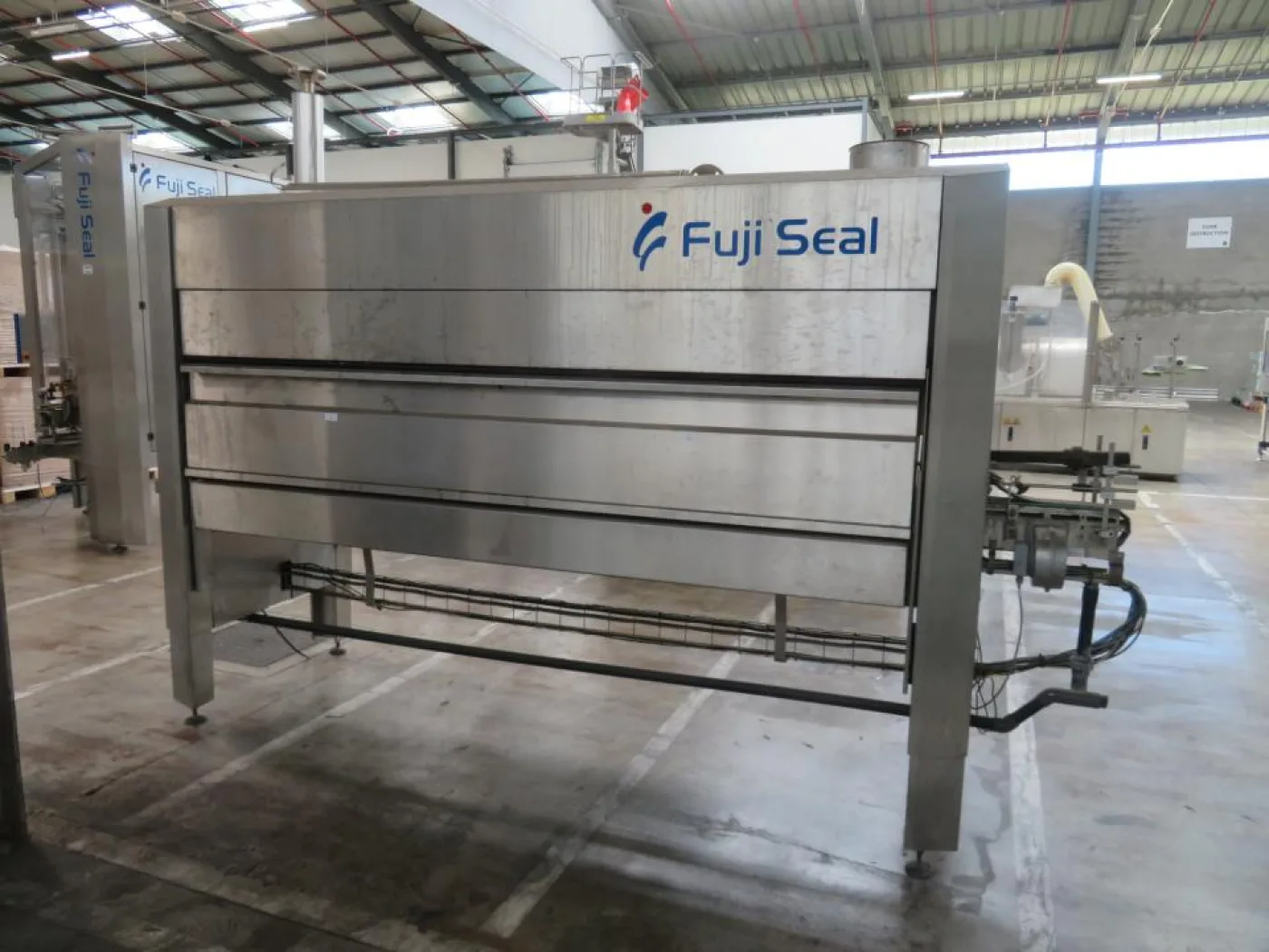 Fuji Seal Europe BV Fuji Seal Heat Shrink Tunnel - Flasche Sleever Line - 7