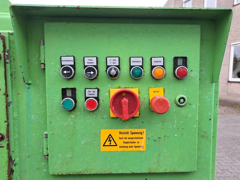 Press with container
