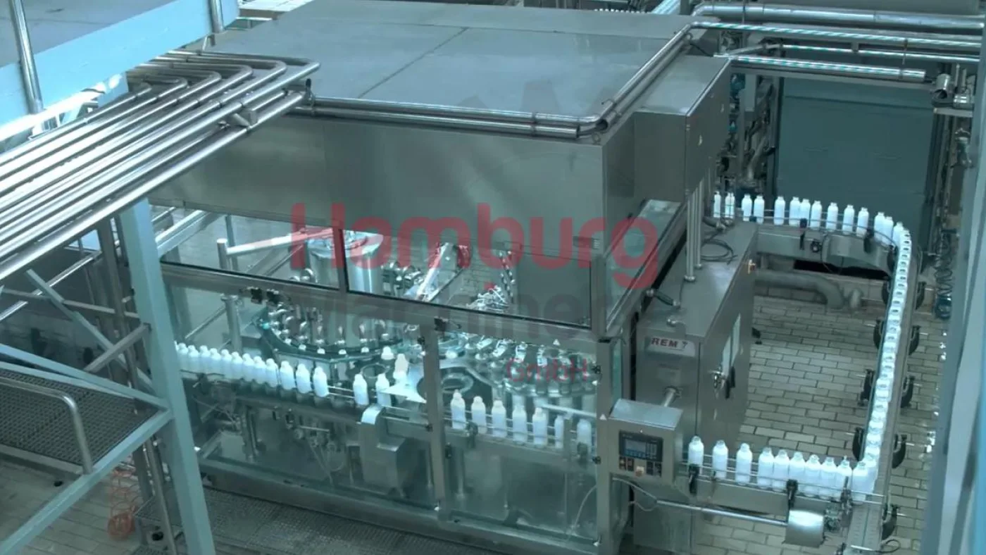 Bottle blowing, filling, closing, sterilizing, labelling and packing line for PE bottles of 1,5 liter with milk - Sidel / Remy / Stork - 2