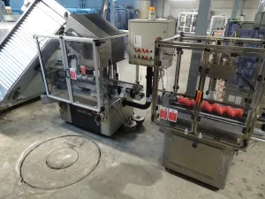 CAPSULE DISTRIBUTOR ROBINO AND GALANDRINO / ROBINO AND GALANDRINO SEALING MACHINE WITH THREE THERMAL HEADS, SECOND-HAND MACHINES