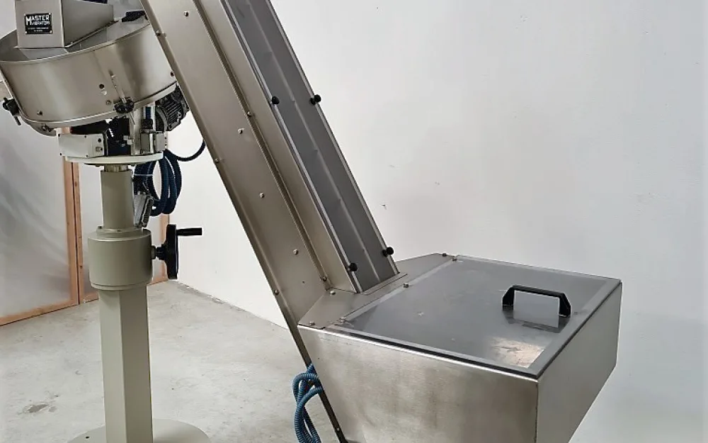 ELEVATORE E ALIMENTATORE PER TAPPI – MASTER VIBRATORI
