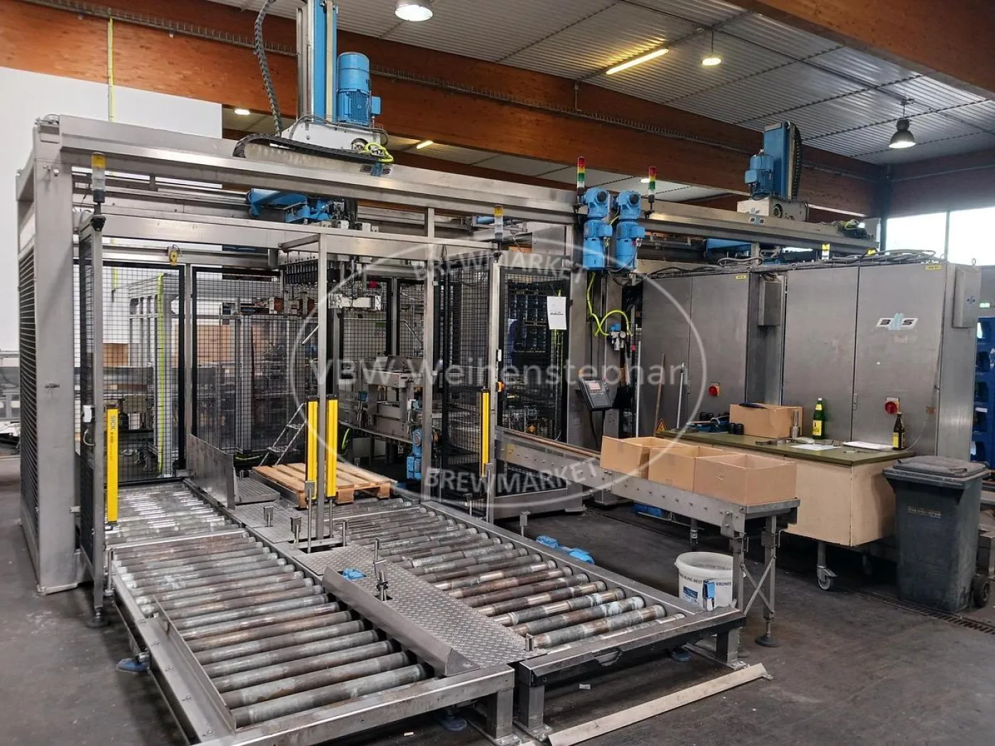 Repalletising system with crating machine - 1