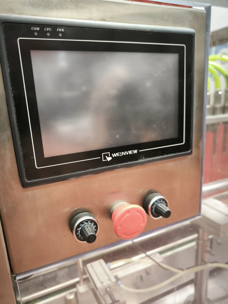 6-NOZZLE BOTTLE FILLING MACHINE FOR 0–600 ML BOTTLES