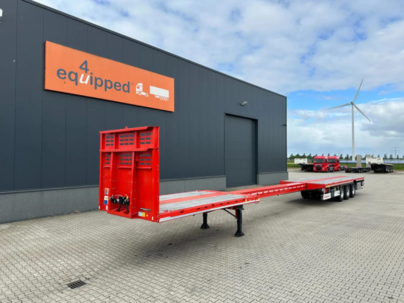 new and unused Heavy-Duty flatbed / 690cm extendable / steering axle / lift axle / twistlocks / timberstakes / NL-trailer / APK: 04-2027 - 2