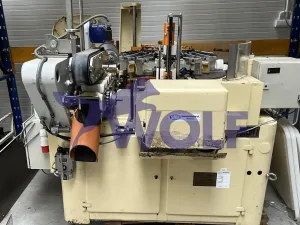 Stannioliermaschine RASCH - Type RG-STR, für Schokoladeneier eingerichtet.