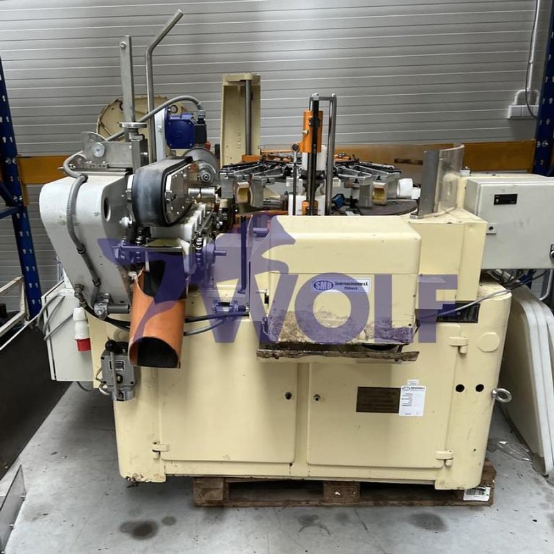 Stannioliermaschine RASCH - Type RG-STR, für Schokoladeneier eingerichtet.