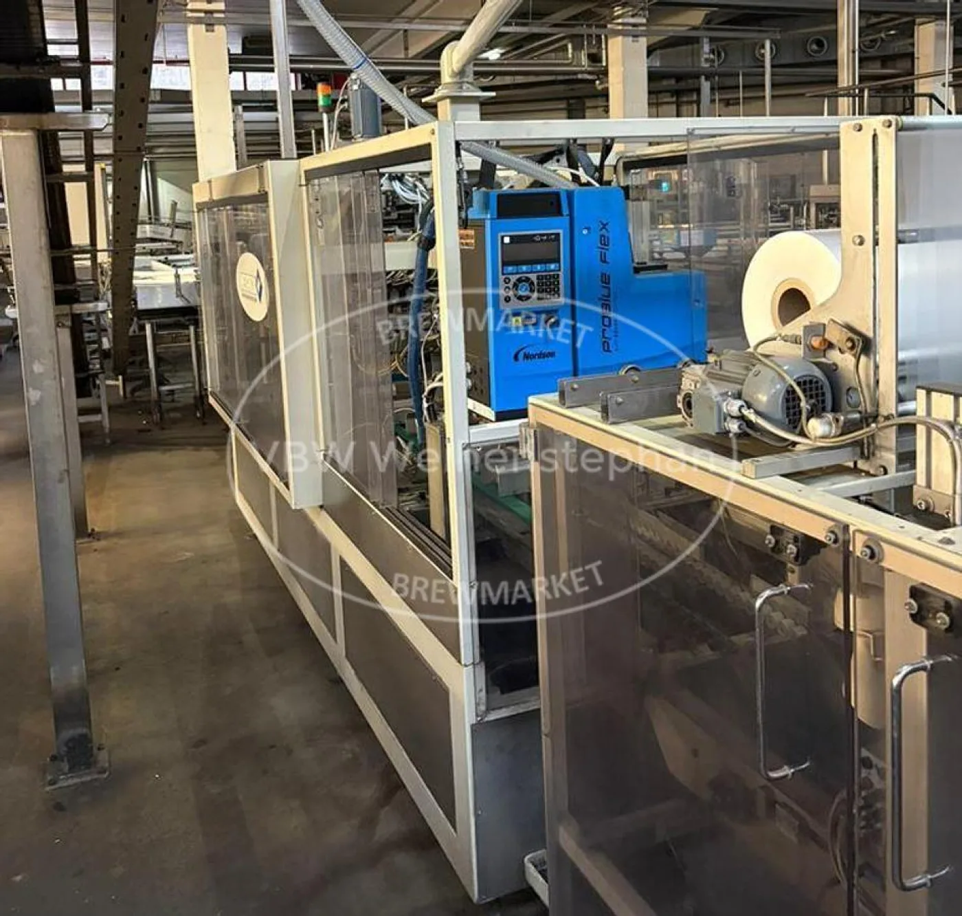 Tray packaging and shrink wrapping machine - 7