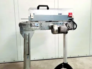 NASTRO TRASPORTATORE A TAPPETO MOTORIZZATO CON CARTER DI PROTEZIONE – SOCO SYSTEM