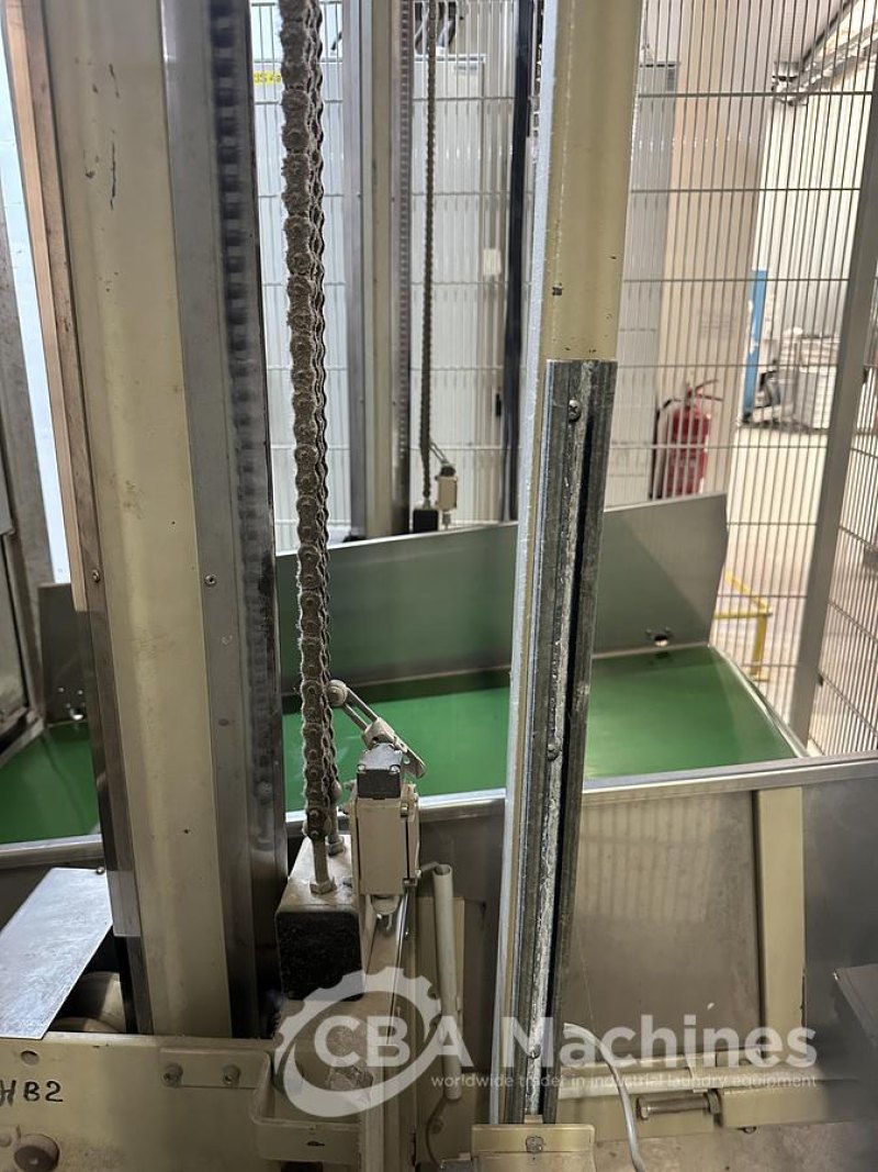 2009 Girbau stationary lift + conveyor to load the 100kg dryer