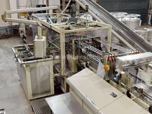 Tray packaging and shrink wrapping machine