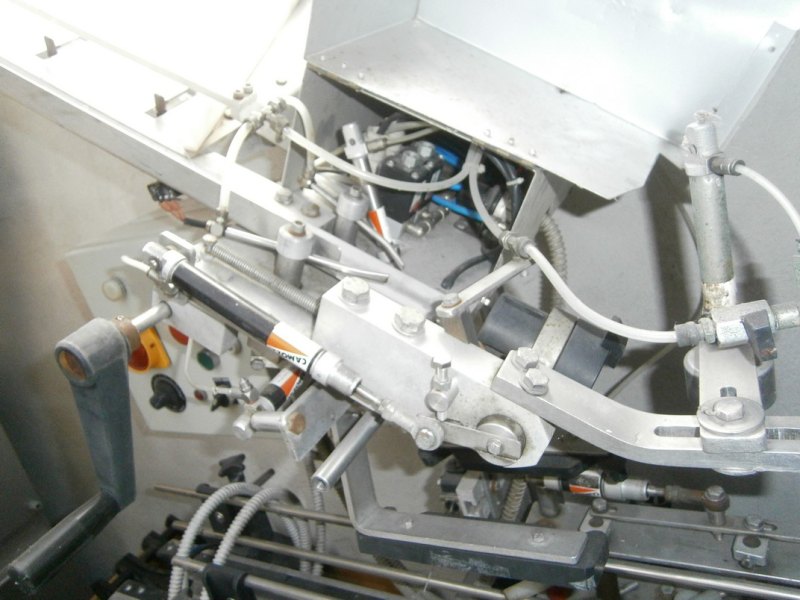 CAPSULES DISTRIBUTOR OMAR, WITH BASE AND CONVEYOR BELT IN STAINLESS STEEL, SECOND-HAND MACHINE