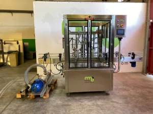 LINEA DE LLENADO Y TAPONADO PARA DETERGENTE EN GARRAFAS