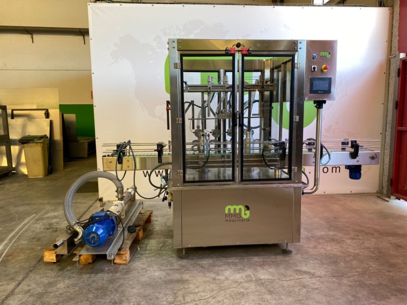 LINEA DE LLENADO Y TAPONADO PARA DETERGENTE EN GARRAFAS