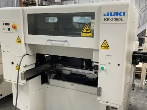 Juki KE-2060L, vintage 2003, plus additional feeders and tables