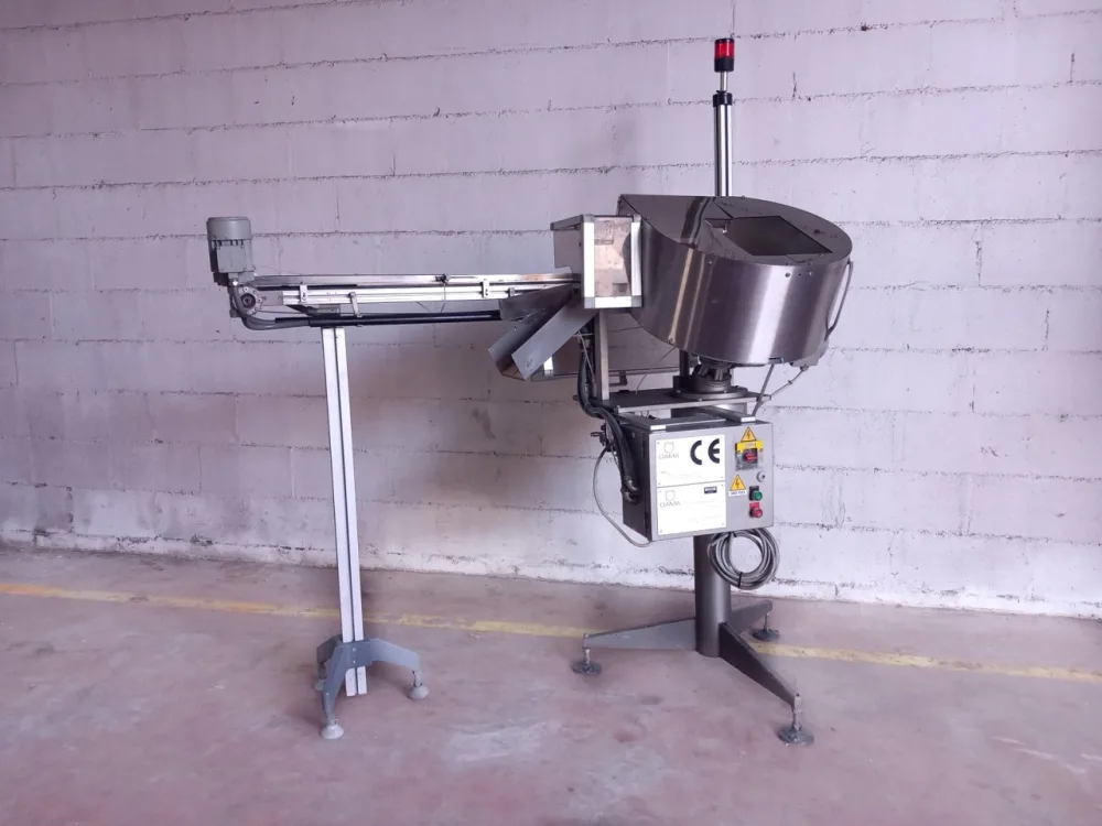 ORIENTATORE ALIMENTATORE VIBRANTE PER TAPPI – GAMA