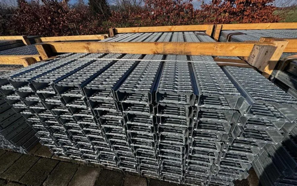 4 tonnes of stacked galvanized steel floor panels