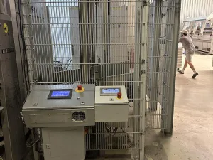 2009 Girbau stationary lift + conveyor to load the 100kg dryer