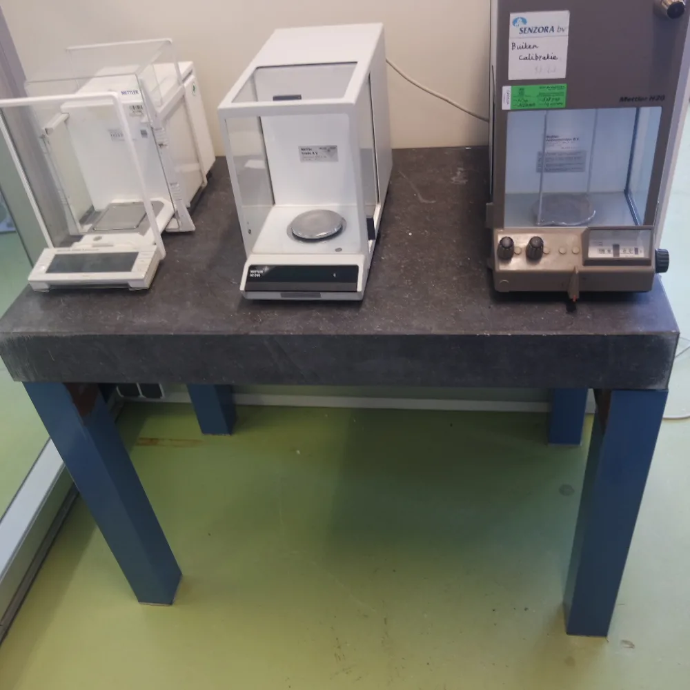 1056-Used laboratory weighing table, granite top