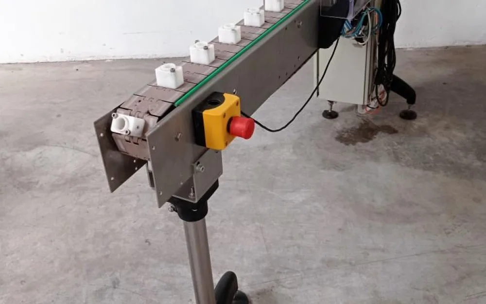NASTRO TRASPORTATORE A TAPPARELLE CON TAPPATTRICE PNEUMATICA