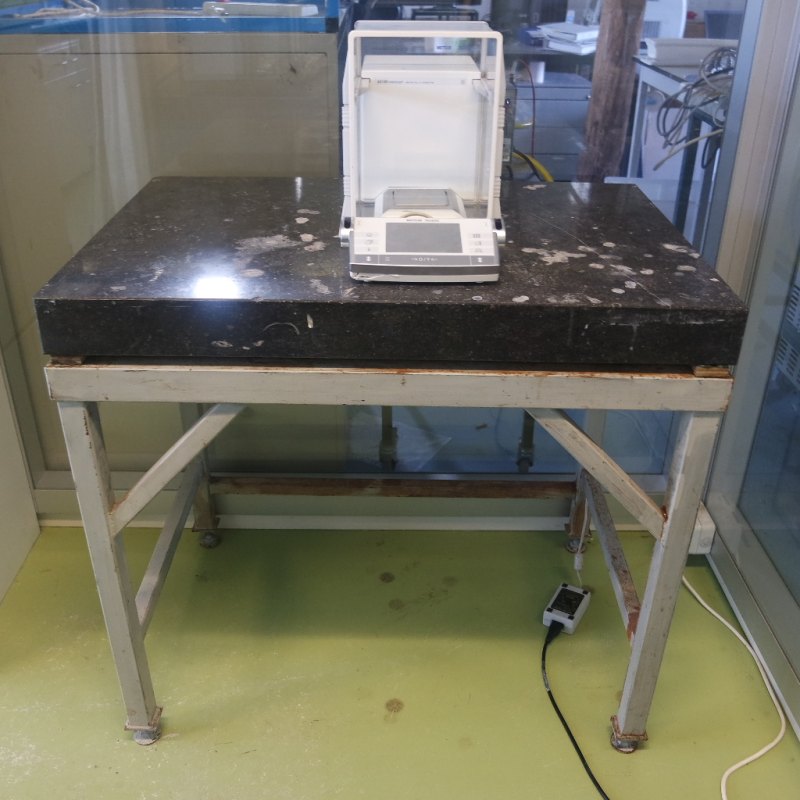 1057-Used laboratory weighing table, granite top