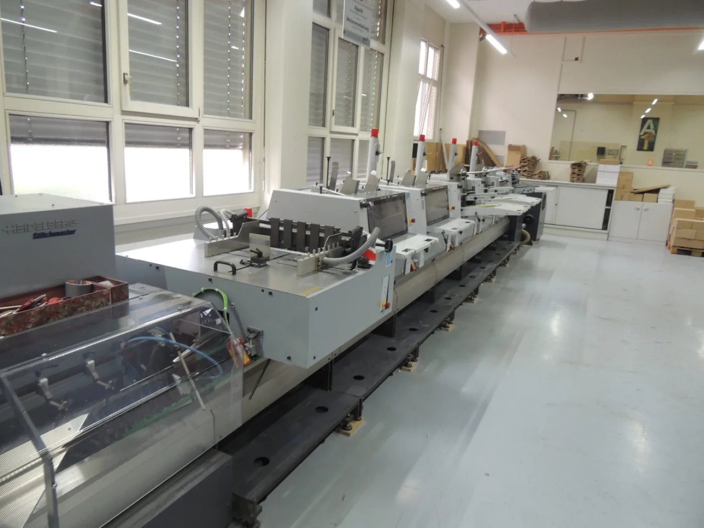 Encarteuse-piqueuse Heidelberg ST400-450 - 2