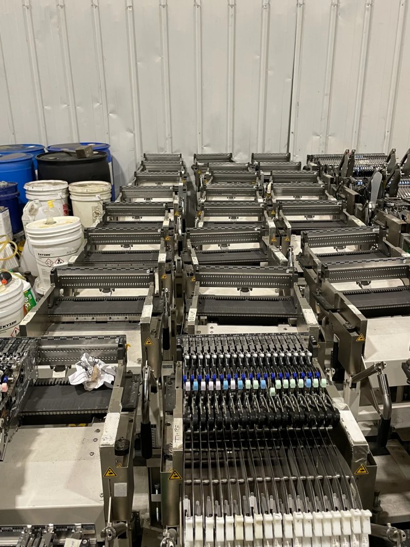 Juki FX-01, vintage 2003, plus additional feeders